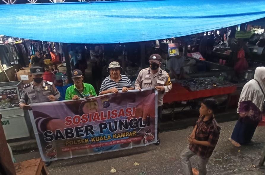 Polsek Kuala Kampar Turun di Pasar Sosialisasi Saber Pungli